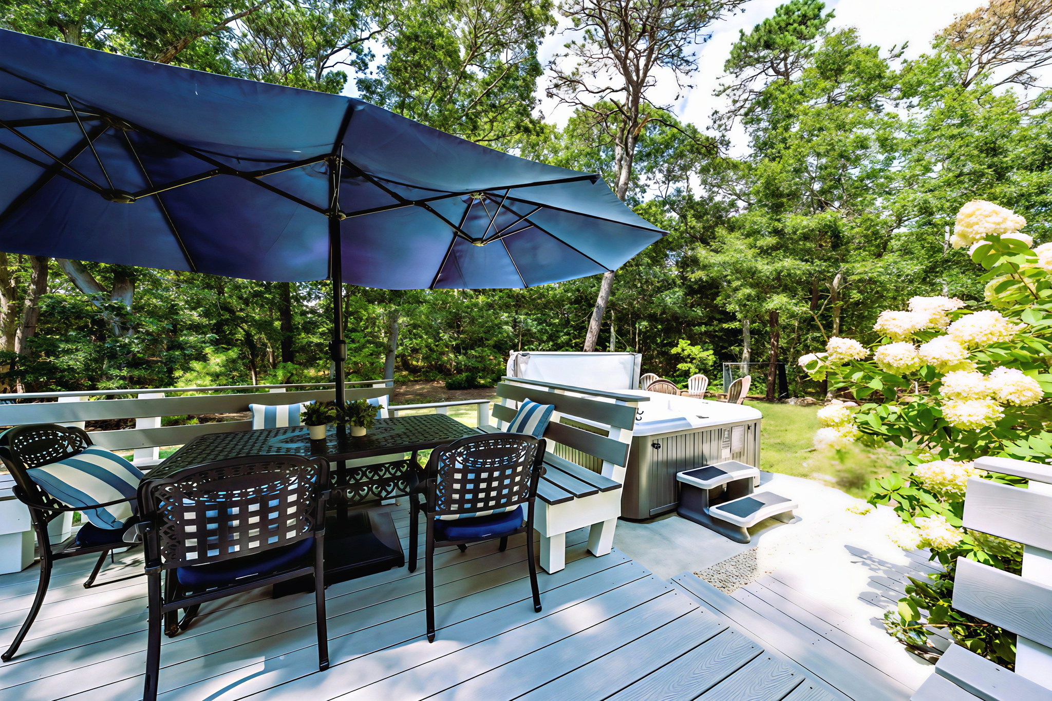 Outdoor deck and yard at Orleans Holiday House